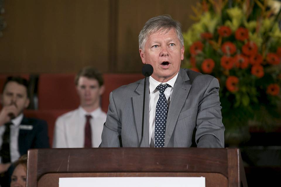 Male speaking at podium