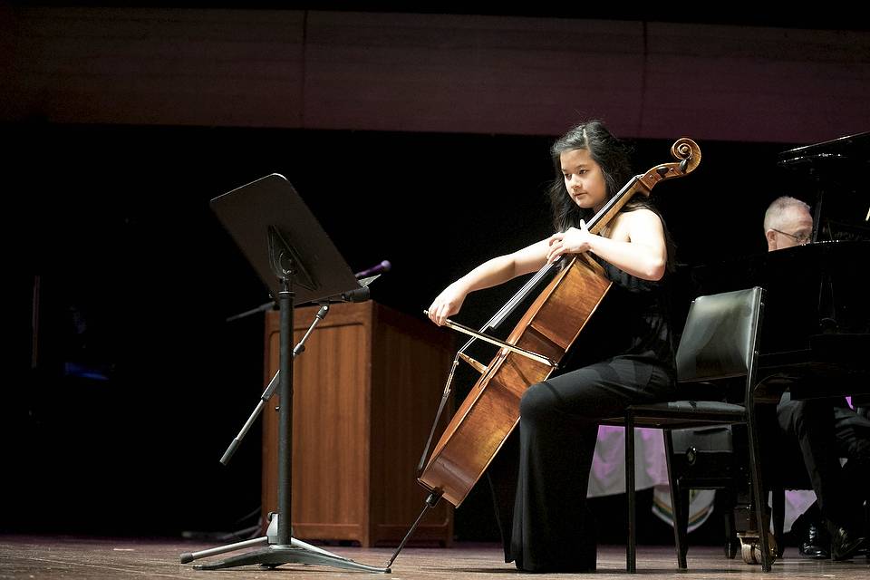 Female Playing Chello on stage